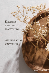 Decorative image featuring the quote "Desire is telling you something, but not what you think" with dried baby's breath arranged on a wooden tray in soft natural light.