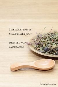 Styled image with the quote "Preparation is sometimes just dressed-up avoidance" beside a wooden spoon and a bowl of loose herbal tea on a light wood surface.
